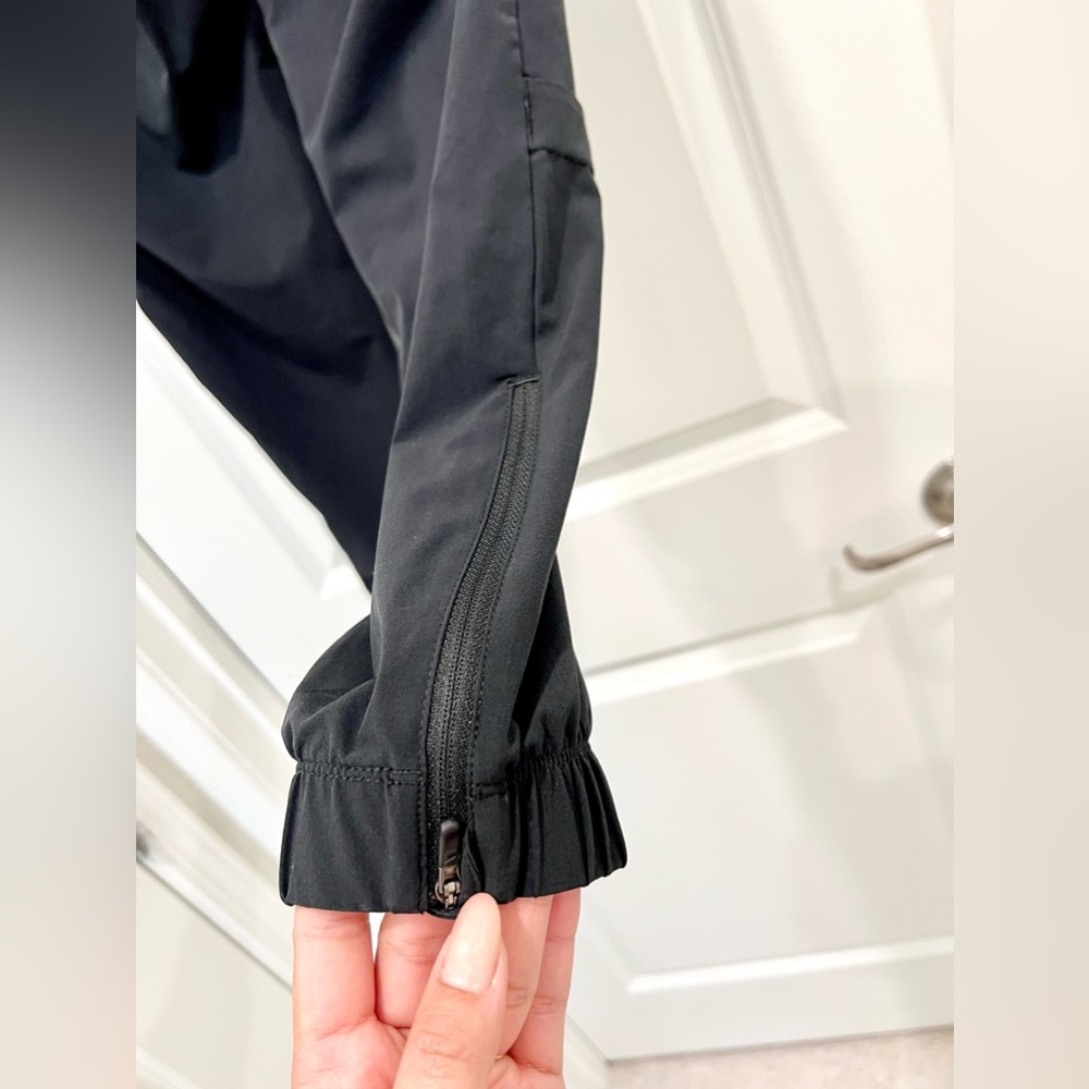 NIKE Women’s Shield Swift Running Pants - Picture 8 of 10